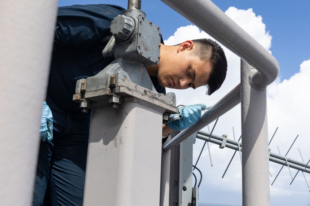 USS Gerald R. Ford (CVN 78) Sailor Conducts Navigation Maintenance