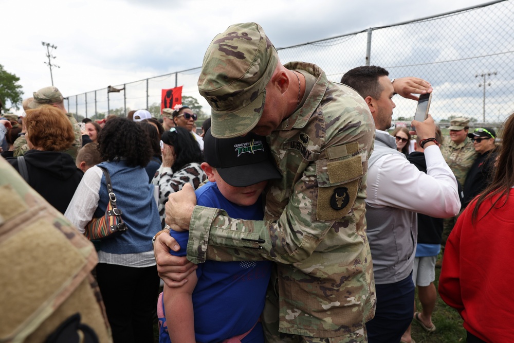 Red Bull Soldier shares a moment before deployment