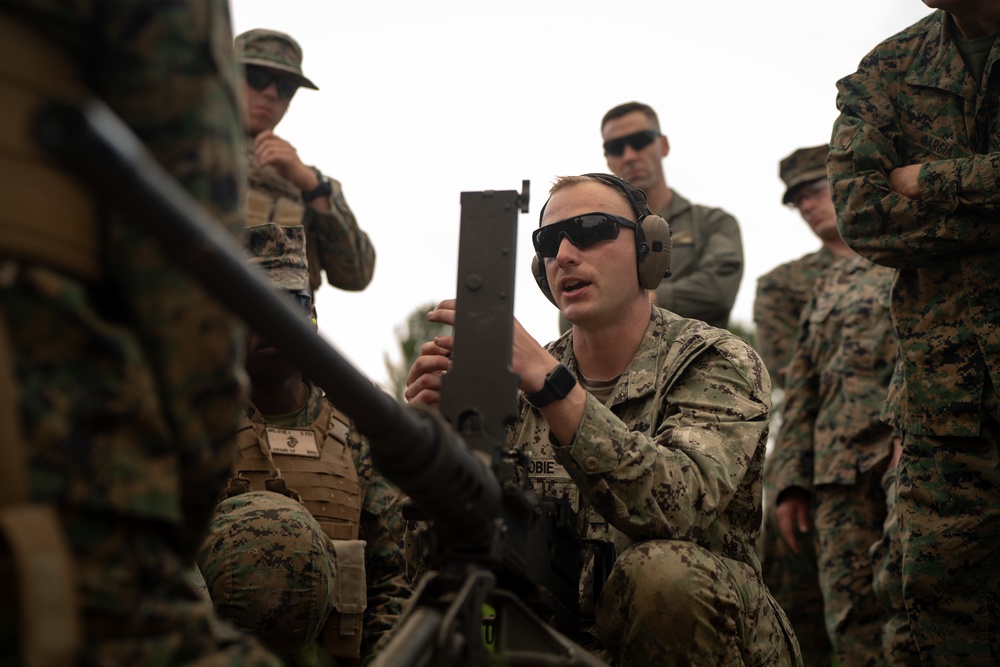 U.S. Coast Guardsmen with PSU 309 and Marines with 4th MAW participate in a joint live-fire machine gun range during Atlantic Alliance 25