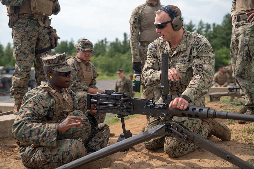 U.S. Coast Guardsmen with PSU 309 and Marines with 4th MAW participate in a joint live-fire machine gun range during Atlantic Alliance 25