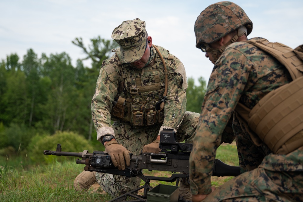 U.S. Coast Guardsmen with PSU 309 and Marines with 4th MAW participate in a joint live-fire machine gun range during Atlantic Alliance 25