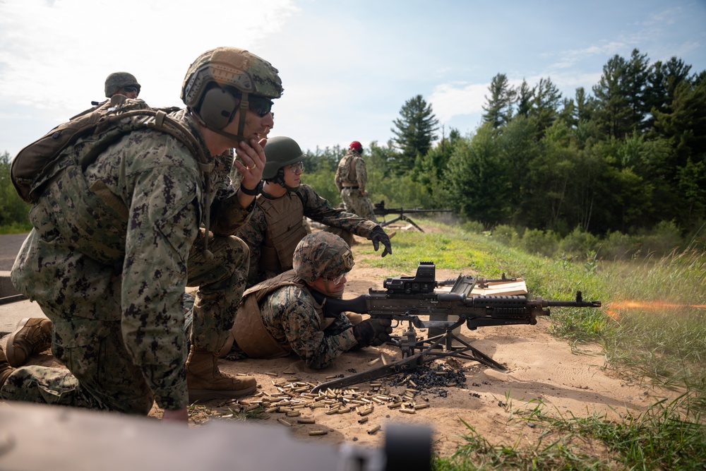U.S. Coast Guardsmen with PSU 309 and Marines with 4th MAW participate in a joint live-fire machine gun range during Atlantic Alliance 25