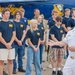 USS Ronald Reagan Commanding Officer Swears In New Recruits During Duluth Navy Week