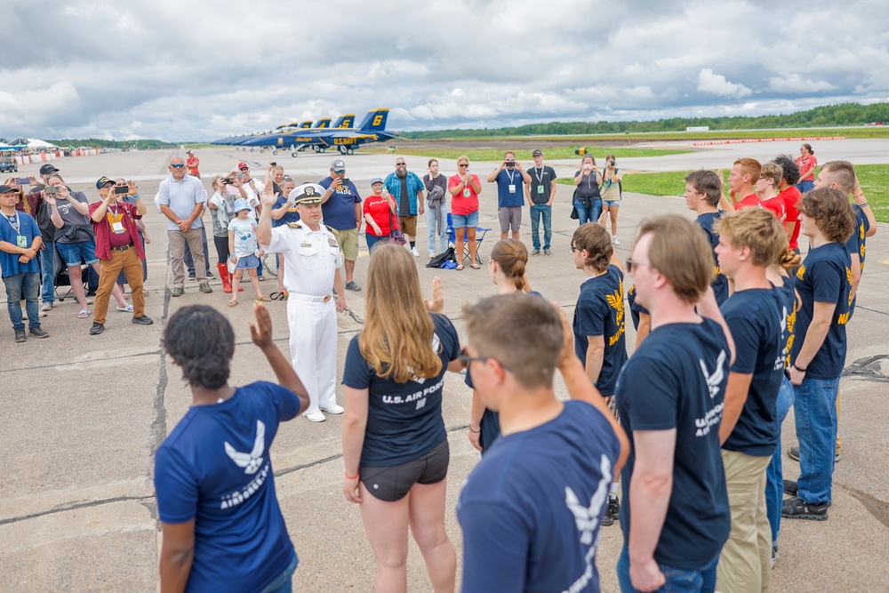 USS Ronald Reagan Commanding Officer Swears In New Recruits During Duluth Navy Week