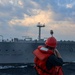 GM3 Daniel Kininmonth uses an M-14 rifle to send a phone and distance line to the USNS Joshua Humphreys (T-AO 188)