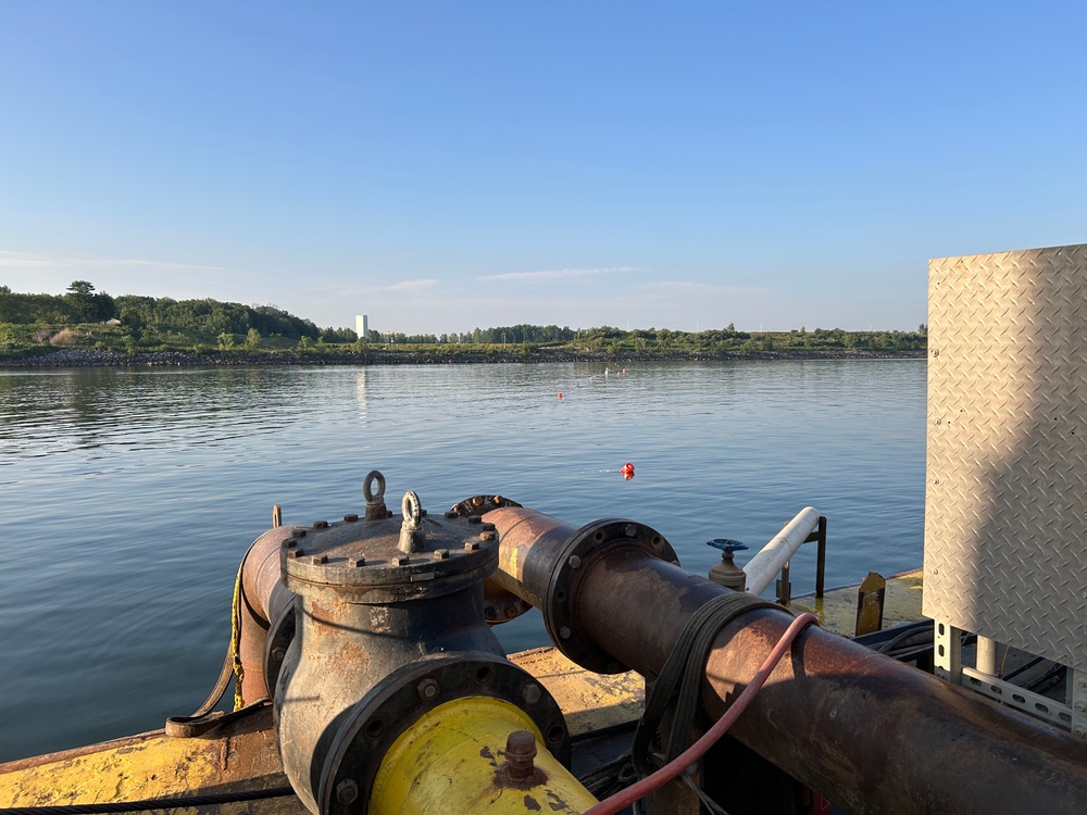 Dredging the Grand River and harbor in Fairport Harbor, Ohio