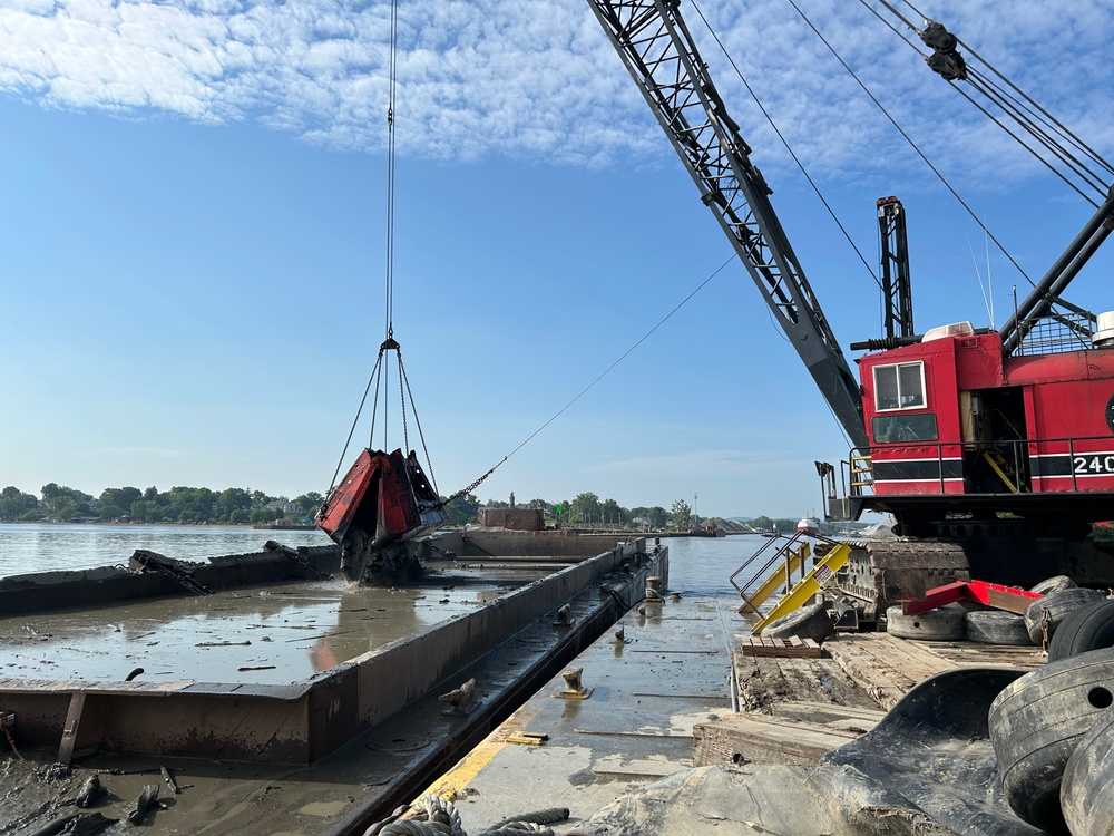 Dredging the Grand River and harbor in Fairport Harbor, Ohio