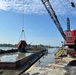 Dredging the Grand River and harbor in Fairport Harbor, Ohio