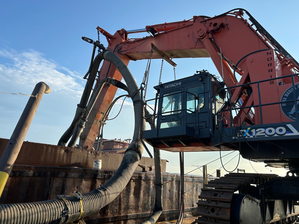 Dredging the Grand River and harbor in Fairport Harbor, Ohio