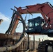 Dredging the Grand River and harbor in Fairport Harbor, Ohio