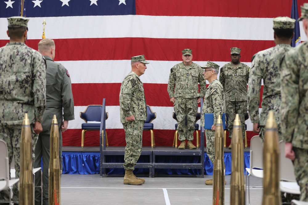 Capt. Aaron Werbel Presents the Meritorious Service Medal to Capt. Thomas Murphy