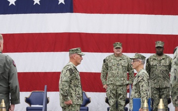 Capt. Aaron Werbel Presents the Meritorious Service Medal to Capt. Thomas Murphy