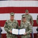 Capt. Aaron Werbel Presents the Meritorious Service Medal to Capt. Thomas Murphy