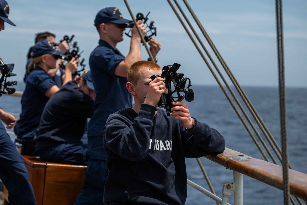 Coast Guard cadets perform sextant training aboard the Eagle