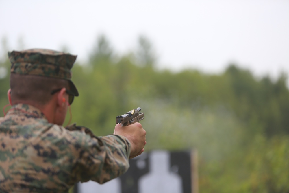 U.S. Marines conduct a pistol qualification course at Atlantic Alliance '25