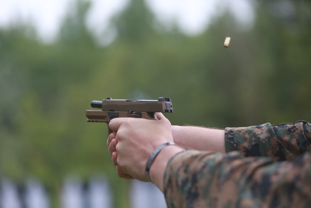 U.S. Marines conduct a pistol qualification course at Atlantic Alliance '25