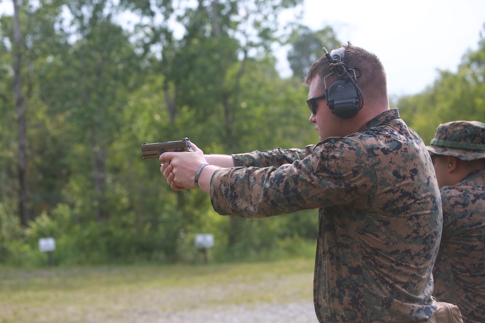 U.S. Marines conduct a pistol qualification course at Atlantic Alliance '25