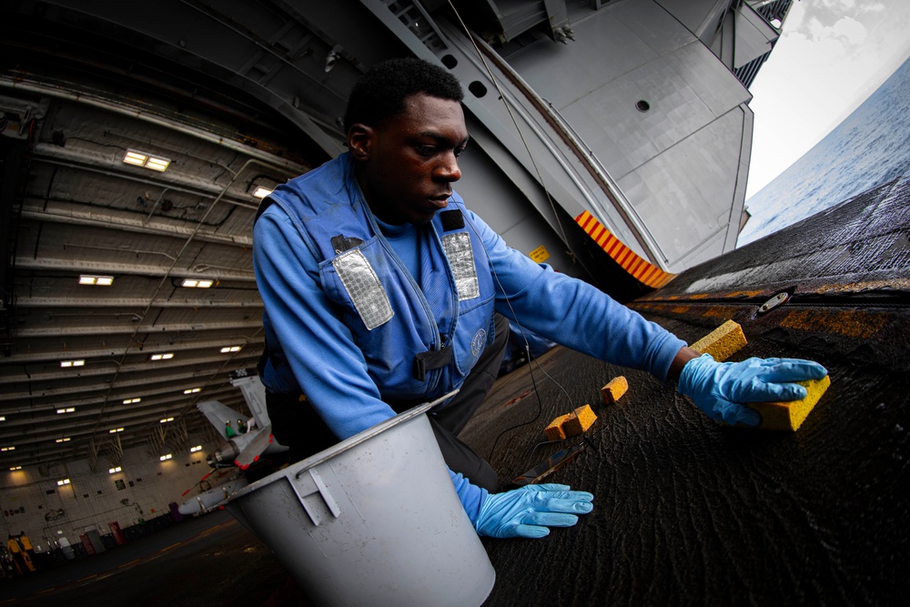 USS Gerald R. Ford (CVN 78) Air Department Sailor Conducts Routine Maintenance