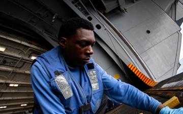 USS Gerald R. Ford (CVN 78) Air Department Sailor Conducts Routine Maintenance