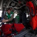 Naval Aircrewman Checks Survival Gear in an MH-60S Sea Hawk