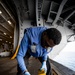 USS Gerald R. Ford (CVN 78) Air Department Sailor Conducts Non-Skid Maintenance