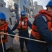 USS Winston S. Churchill (DDG 81) Sailors Handle Line