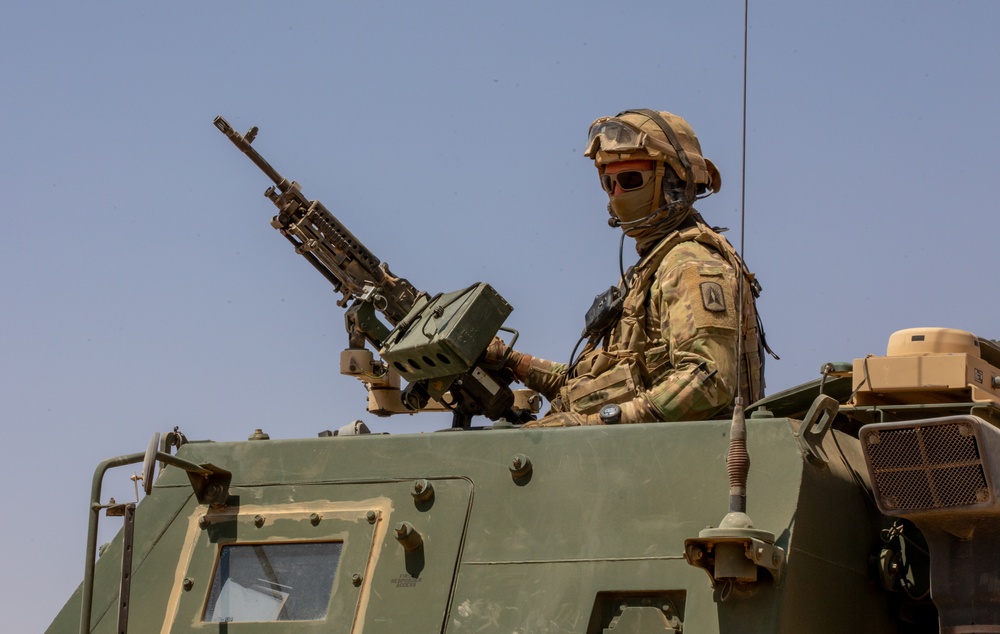 Patrolling the Desert, U.S. Army Mobile Artillery Rocket Systems on the Lookout