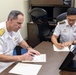 Commander, Submarine Group 7 and Republic of Singapore Commander, 7th Flotilla sign Action Items