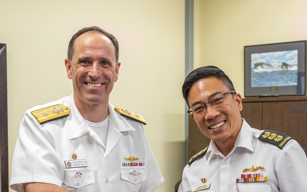 Commander, Submarine Group 7 and Republic of Singapore Commander, 7th Flotilla sign Action Items