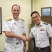 Commander, Submarine Group 7 and Republic of Singapore Commander, 7th Flotilla sign Action Items
