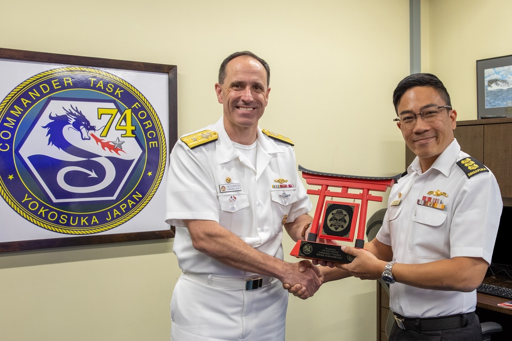 Commander, Submarine Group 7 and Republic of Singapore Commander, 7th Flotilla sign Action Items