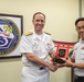 Commander, Submarine Group 7 and Republic of Singapore Commander, 7th Flotilla sign Action Items