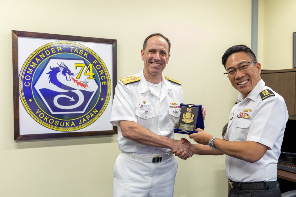 Commander, Submarine Group 7 and Republic of Singapore Commander, 7th Flotilla sign Action Items