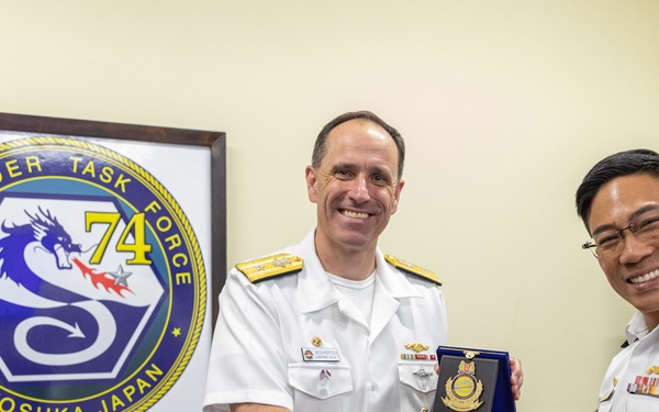 Commander, Submarine Group 7 and Republic of Singapore Commander, 7th Flotilla sign Action Items