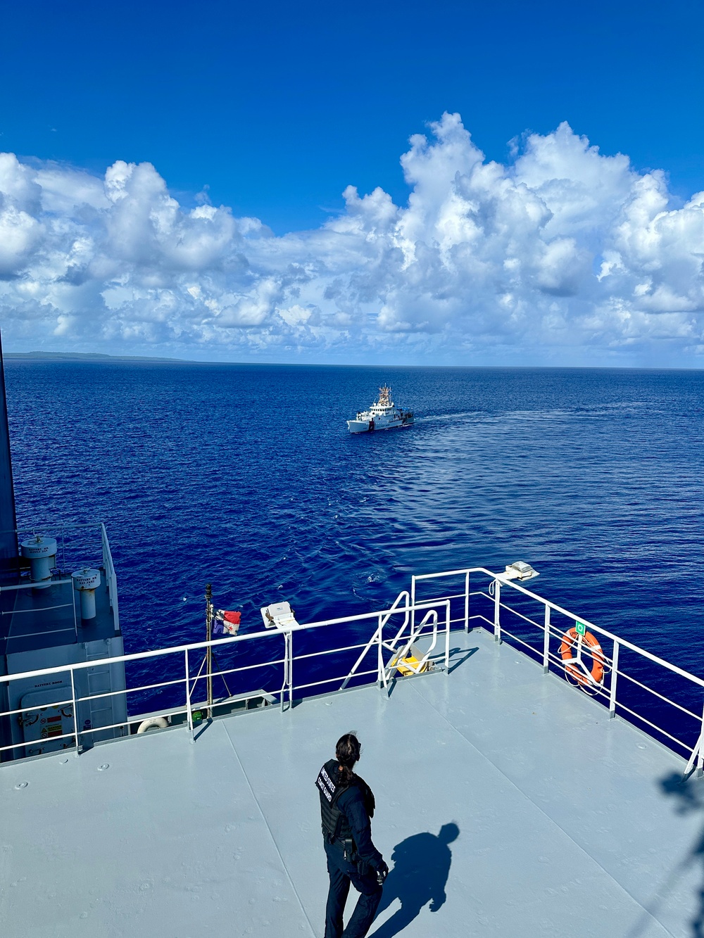 USCGC Oliver Henry crew, Forces Micronesia SBT board commercial vessels Guam