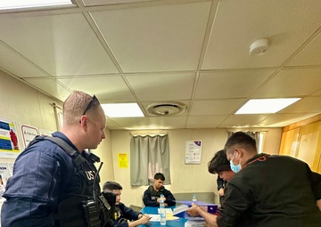 USCGC Oliver Henry crew, Forces Micronesia SBT board commercial vessels Guam