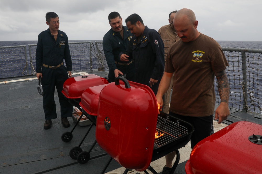 Sailors aboard the USS John Finn hold a Fourth of July celebration in the Philippine Sea