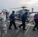 Sailors aboard the USS John Finn conduct flight quarters in the Philippine Sea