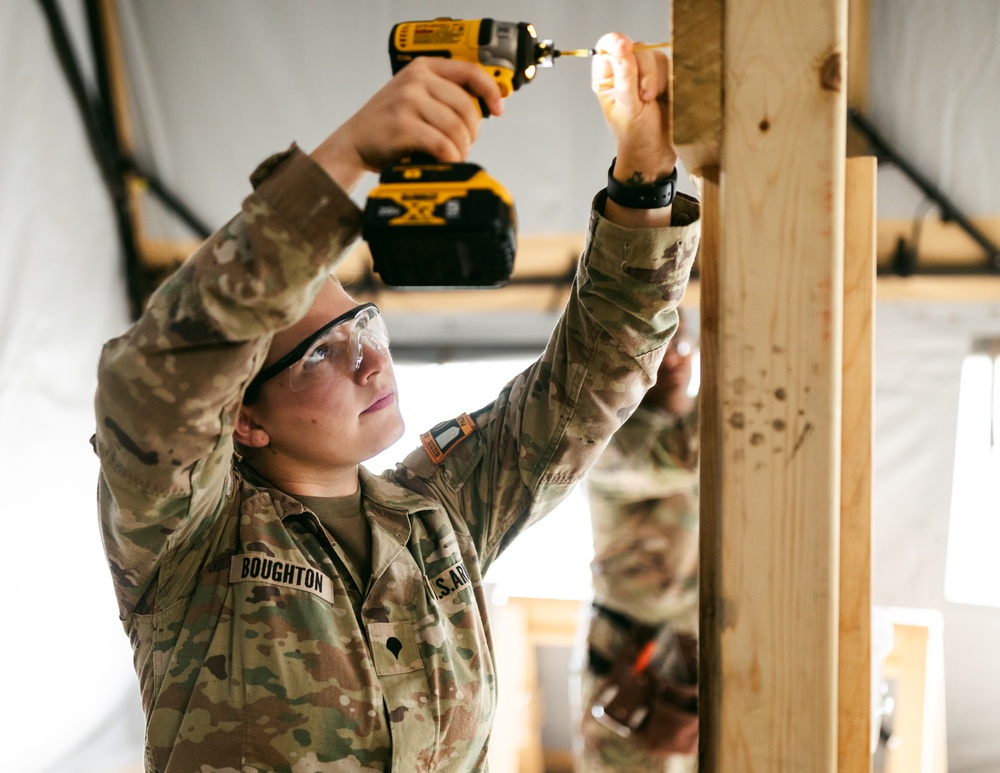 Spc. Bouton Supports Training Missions Through Carpentry