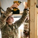 Spc. Bouton Supports Training Missions Through Carpentry