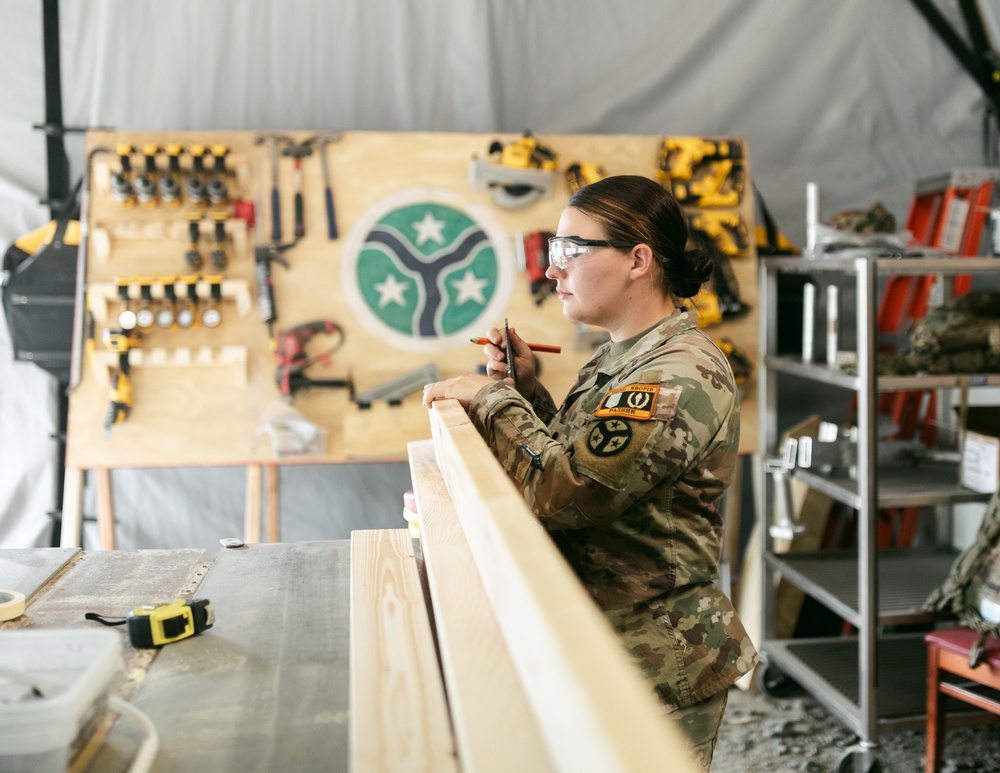 Spc. Bouton Supports Training Missions Through Carpentry