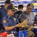 George Washington Hosts Tour for Philippine Police, NCIS Agents