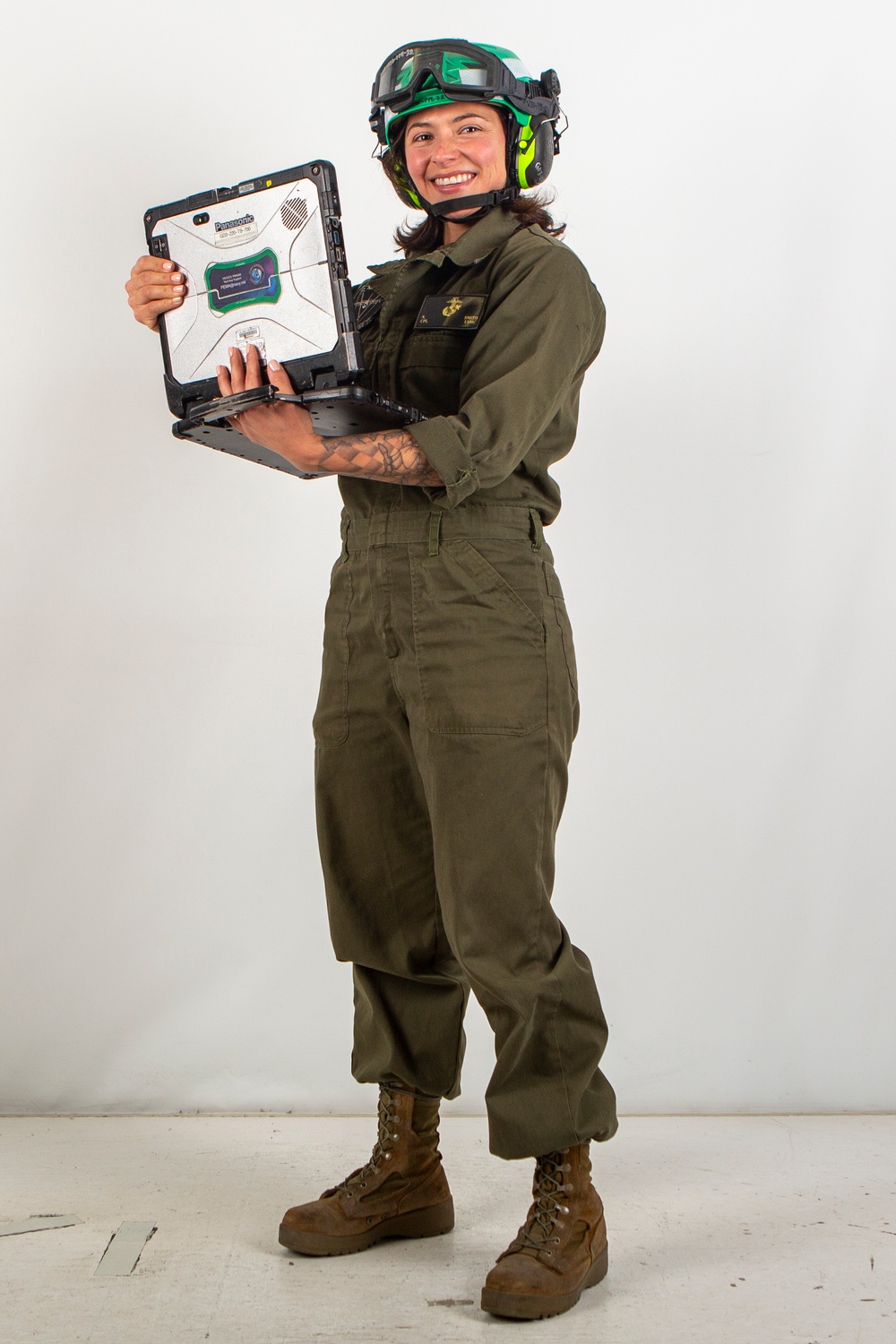 MAG-11 technicians pose for Content