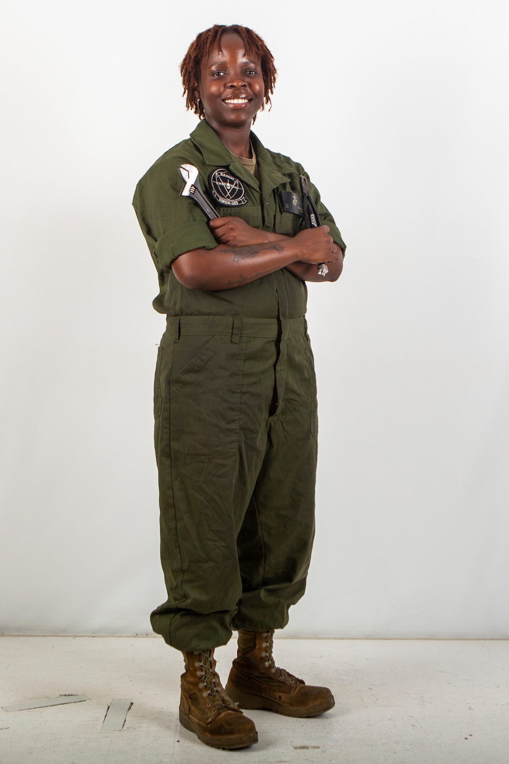 MAG-11 technicians pose for Content