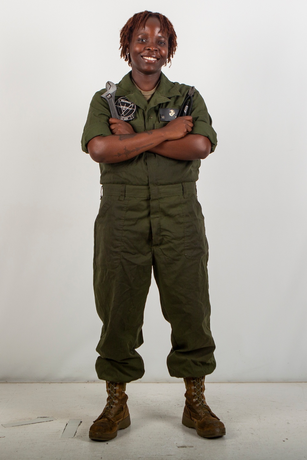 MAG-11 technicians pose for Content