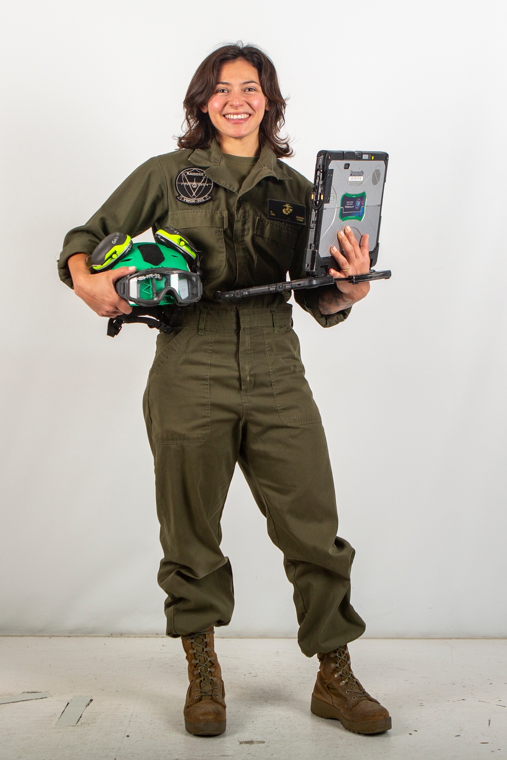 MAG-11 technicians pose for Content