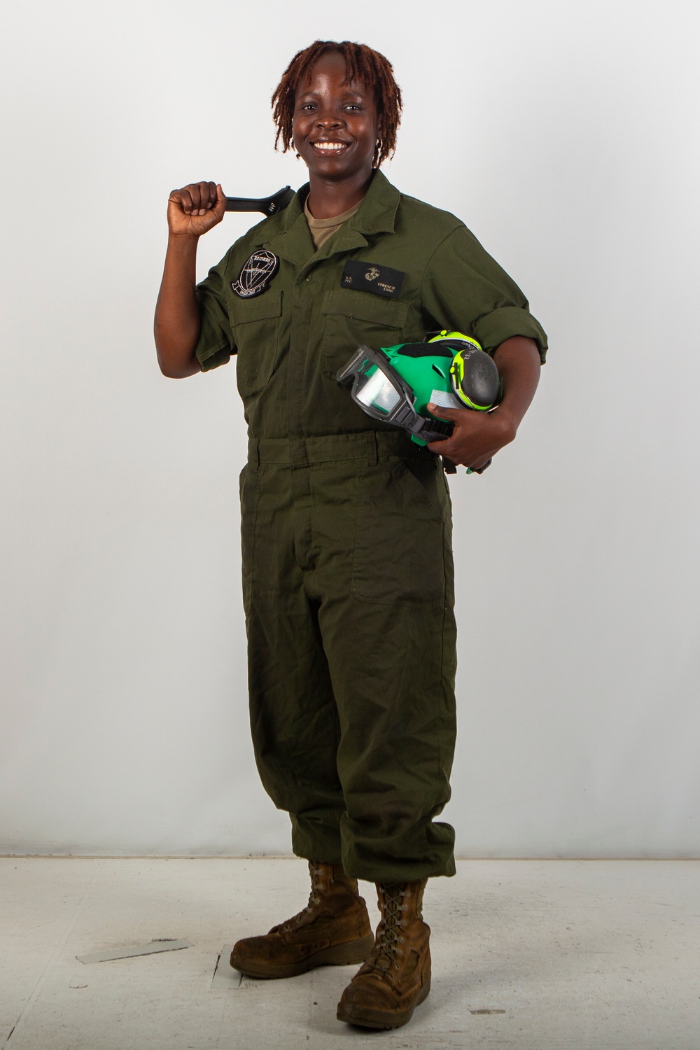 MAG-11 technicians pose for Content