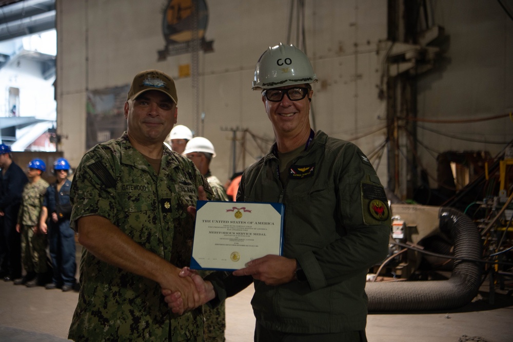 USS John C. Stennis (CVN 74) Ships First Lt. gets Rung Ashore.