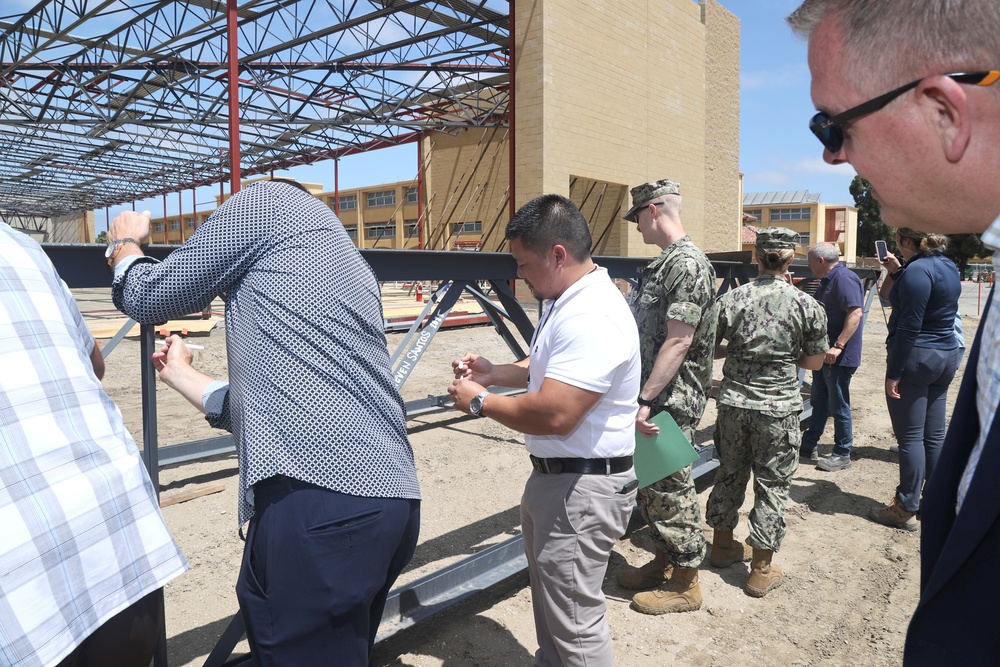 NAVFAC Southwest, MCRD San Diego Teams Sign Mess Hall Project's Ceremonial Topping-Off Beam