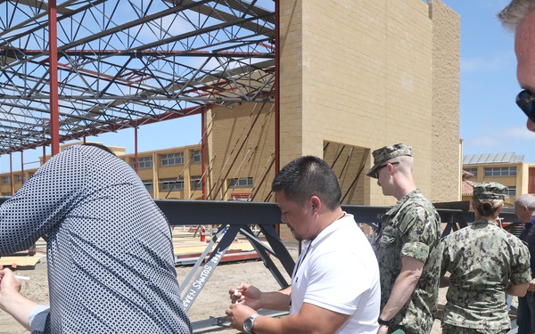 NAVFAC Southwest, MCRD San Diego Teams Sign Mess Hall Project's Ceremonial Topping-Off Beam